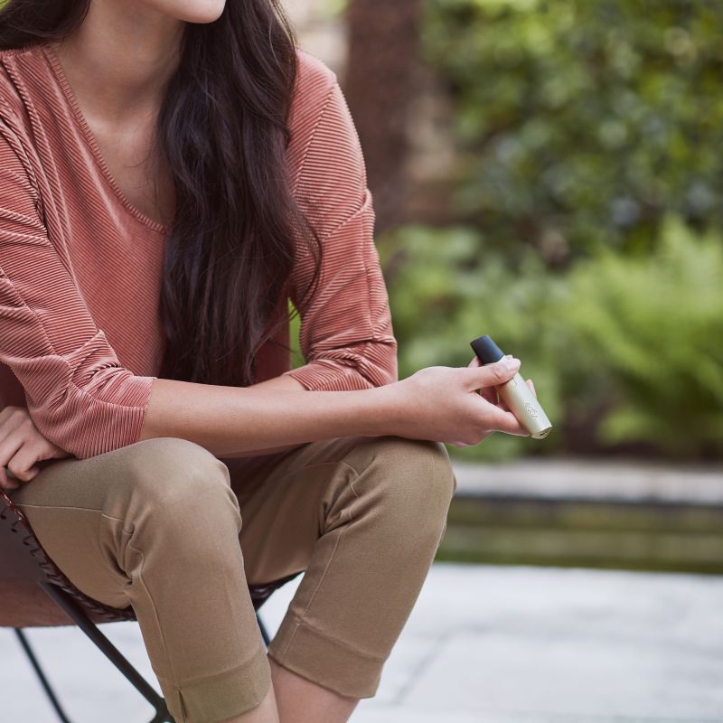 Young Woman Using Vype ePen 3 Young Woman Using Vype ePen 3